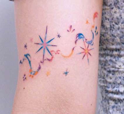Whimsical feminine Star Tattoo