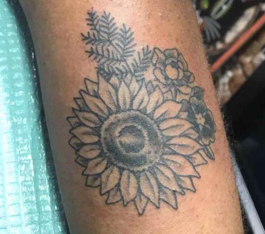 Whimsical sunflower tattoo style