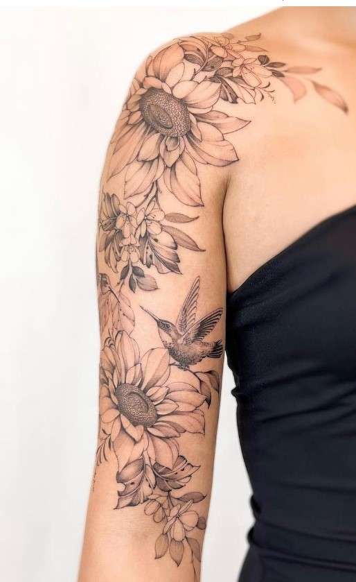 Whimsical sunflower sleeve tattoo
