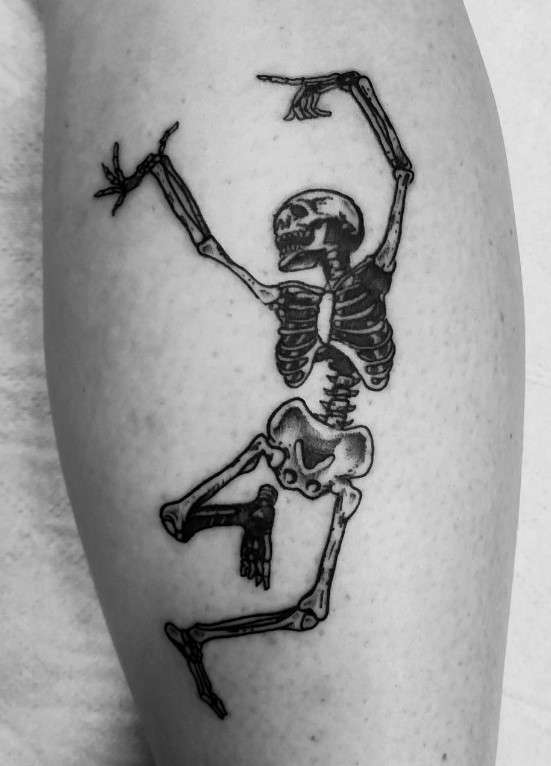 Danse Macabre tattoo on back leg