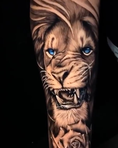 Angry Lion with Blue eyes tattoo