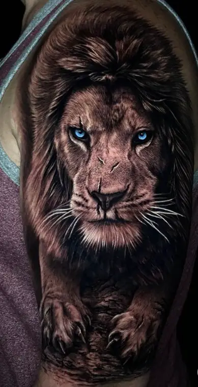 aggressive Lion with Blue eyes tattoo