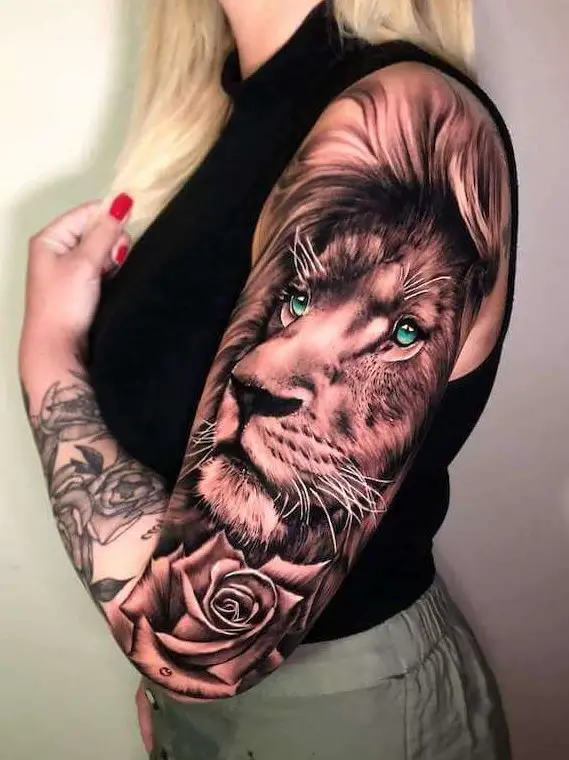Lion with Blue eyes tattoo on full sleeve