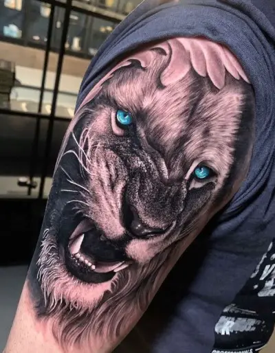 Lion with Blue eyes tattoo