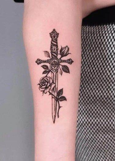 Simple Dagger And Rose tattoo
